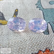 Пара лавандовых аметистов из Бразилии огранки Баснословно овал 13,98x11,03 13,99x10,89мм 14,4 карат