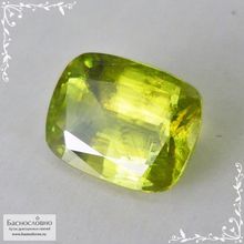 Желтовато-зелёный сфен (титанит) из Афганистана огранки кушон 9,9x7,55мм 3,1 карата