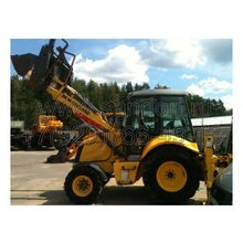 Экскаватор погрузчик New Holland B100B LR