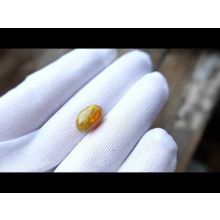 Огненный опал из Эфиопии огранка овал кабошон 14x9,88мм 4,14 карат