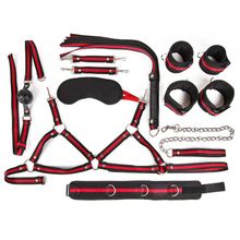 Черно-красный набор БДСМ: наручники, оковы, ошейник с поводком, кляп, маска, плеть, лиф черный с красным