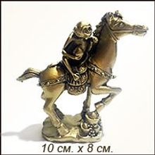 Обезьяна на лошади