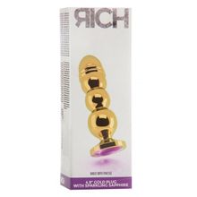 Золотистая фигурная анальная пробка R10 RICH Gold Purple с фиолетовым кристаллом - 14,5 см. Фиолетовый