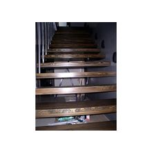 Консольная лестница из лиственницы. Облицовка металлокаркаса. 2015 год.