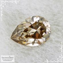 Циркон оттенка Шампань из Танзании (Танга) огранки в Баснословно груша 14,13x10,05мм 7,8 карат
