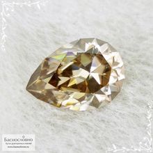 Циркон оттенка Шампань из Танзании (Танга) огранки в Баснословно груша 14,13x10,05мм 7,8 карат