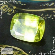 Желтовато-зелёный сфен (титанит) из Афганистана огранки кушон 9,9x7,55мм 3,1 карата