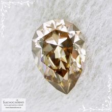 Циркон оттенка Шампань из Танзании (Танга) огранки в Баснословно груша 14,13x10,05мм 7,8 карат