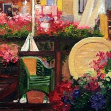 Картина на холсте маслом "Кафе в цветах над городским каналом"