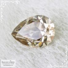 Циркон оттенка Шампань из Танзании (Танга) огранки в Баснословно груша 14,13x10,05мм 7,8 карат