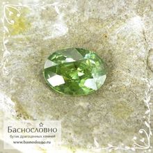 Зелёный демантоид (гранат андрадит) из Мадагаскара огранка 8x6мм 1,53 карат